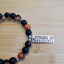 Strong is Beautiful in Orange and Black Bracelet (MW) | Mamabug ReCreations - Artisan Jewelry